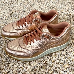 Nike Women's Sneakers in Metallic Bronze